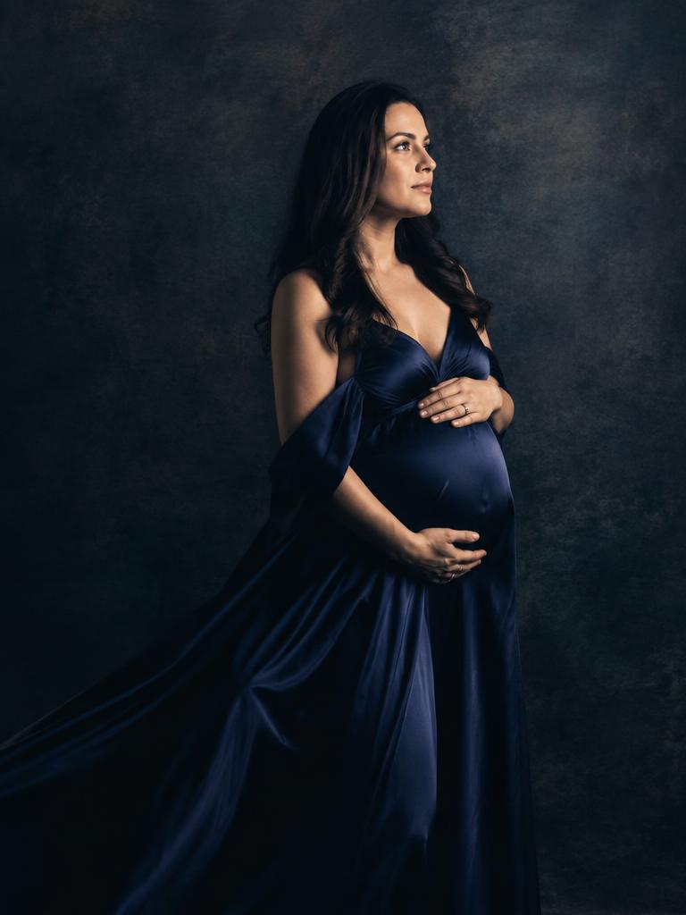 Navy silk against a dark backdrop