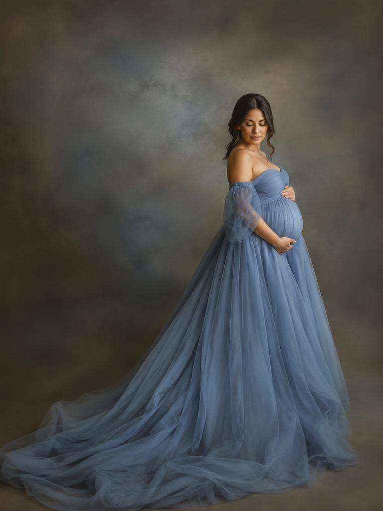 Dusty blue tulle with a long train